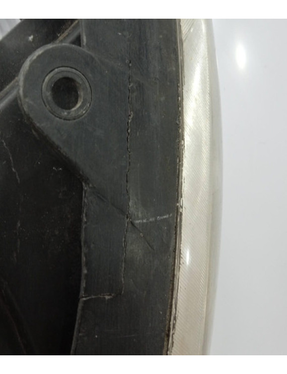 Farol Esquerdo Fox 2003 - 2009 / Detalhe